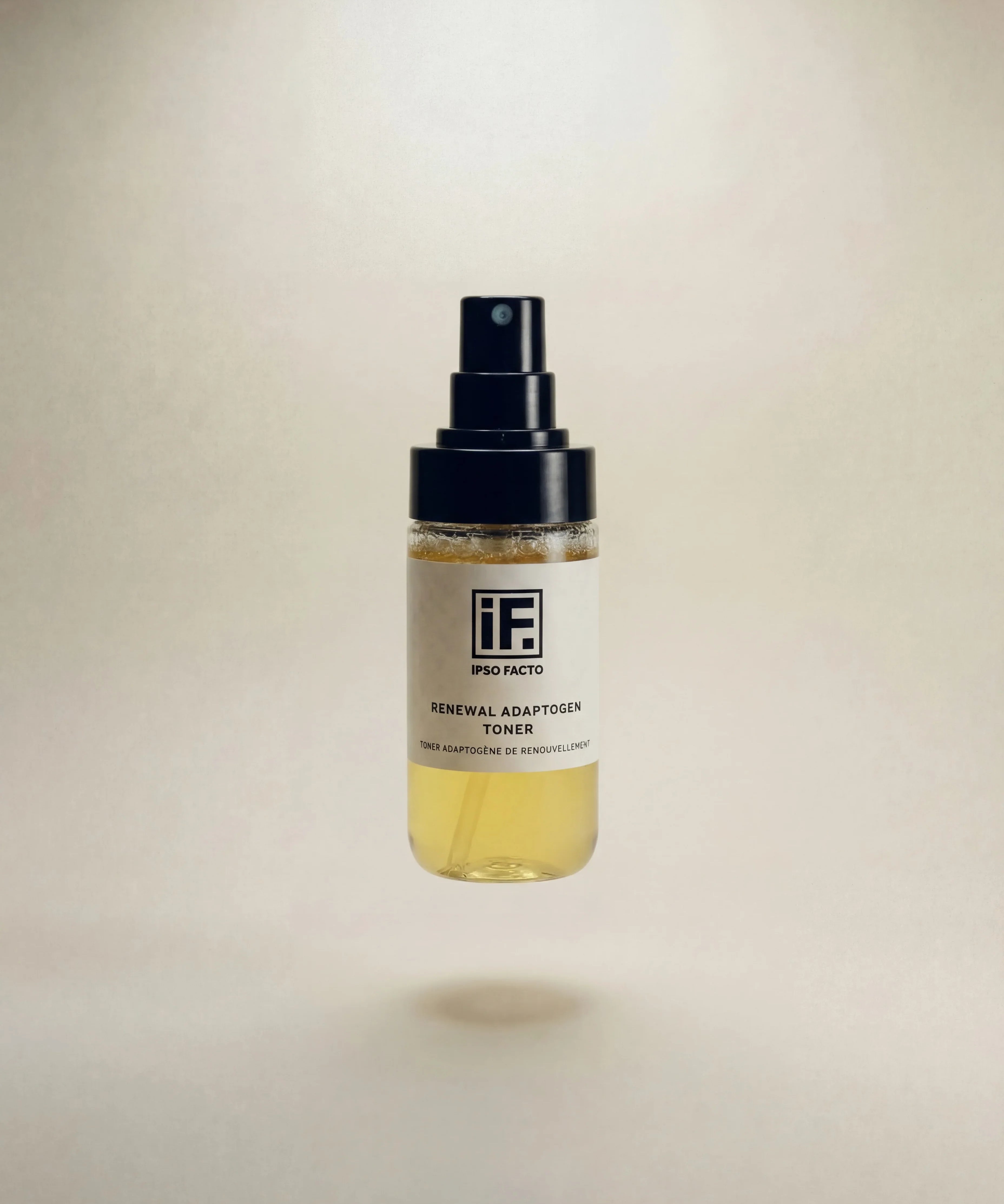 Renewal Adaptogen Toner spray bottle with minimalist label on neutral background