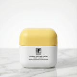 Rosehip Peel and Polish skincare jar with yellow lid on marble surface